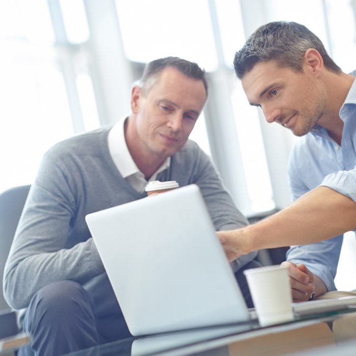 Laptop, Review And Businessman With Client Collaboration, Teamwork And Strategy For Company Finance. Corporate Businessman With Partner Consulting, Reading Feedback On Ideas For Website, Budget Quote