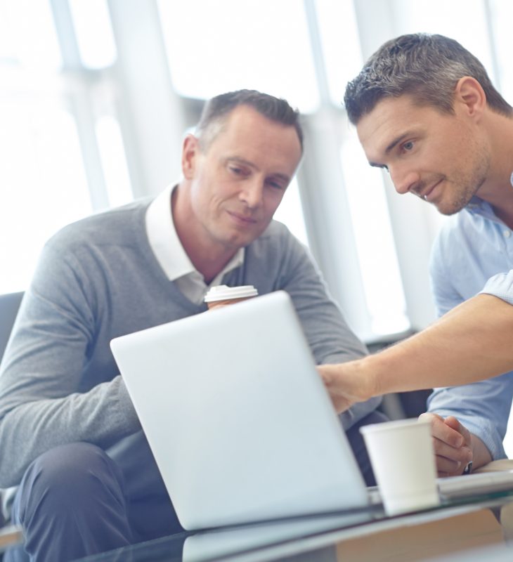 Laptop, Review And Businessman With Client Collaboration, Teamwork And Strategy For Company Finance. Corporate Businessman With Partner Consulting, Reading Feedback On Ideas For Website, Budget Quote